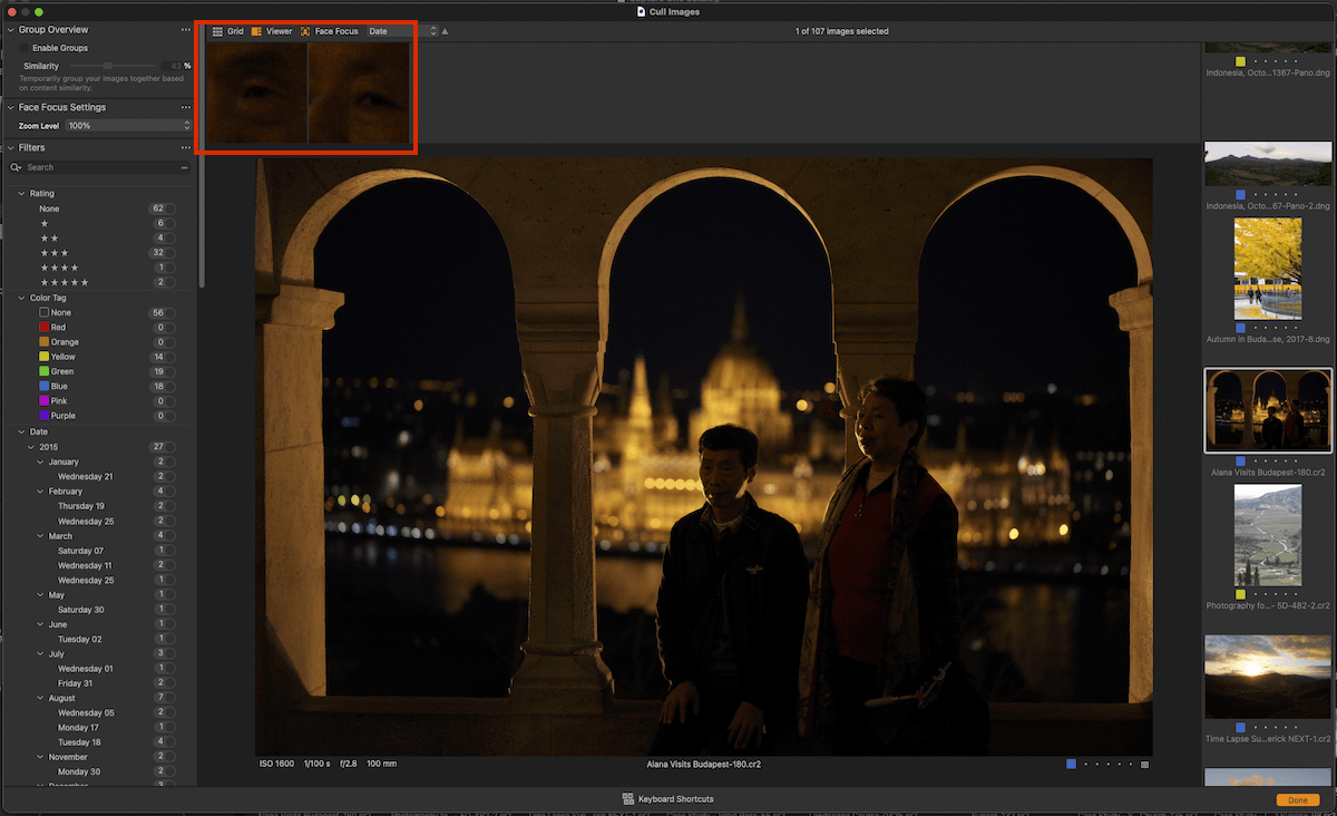 Screenshot of face focus areas highlighted in Culling view in a low-light scene of people standing under arches